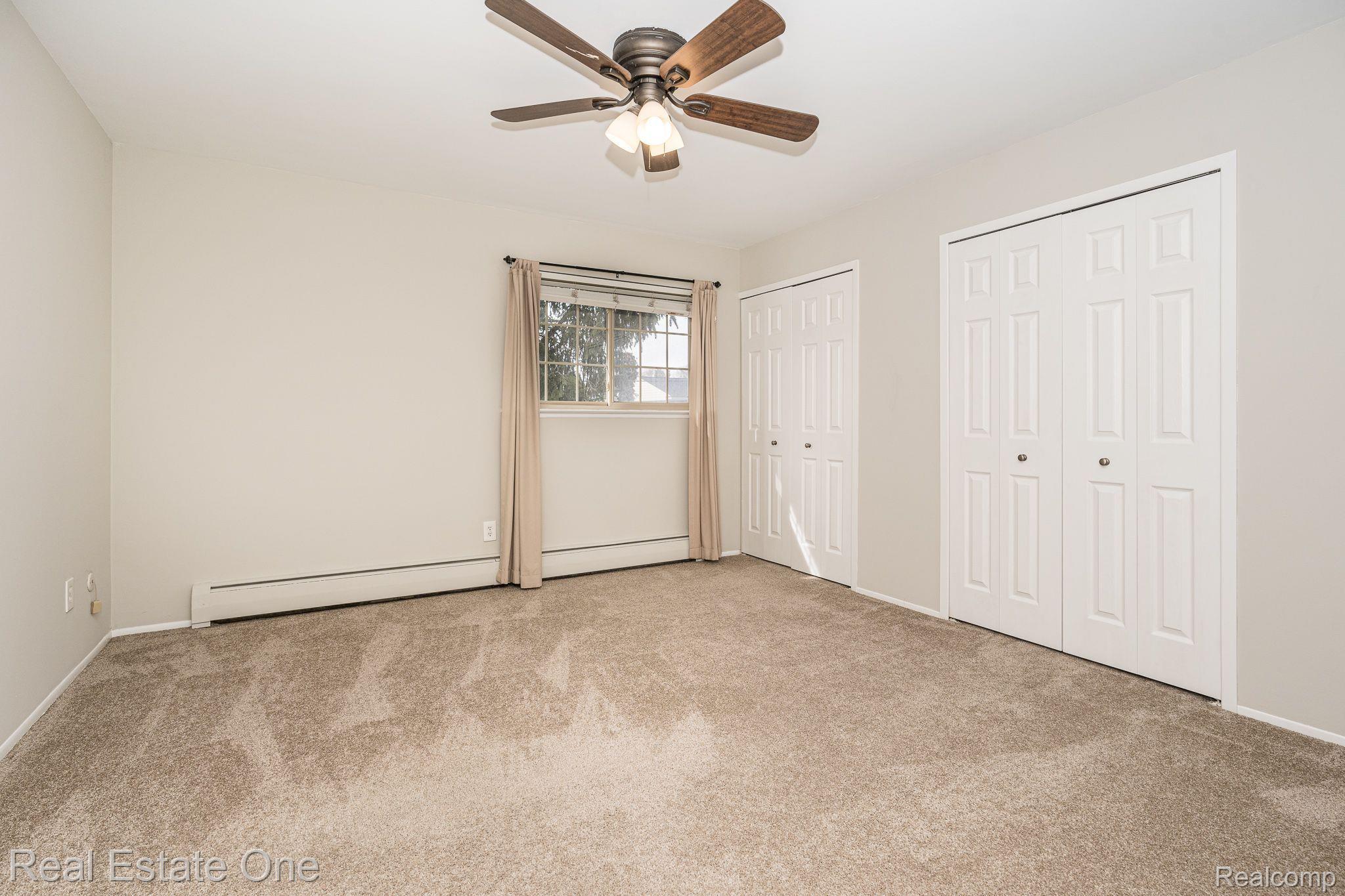 436 Romeo Road, Unit 323 Rochester, MI 48307 - Photo 15 of 19 Spacious Bedroom