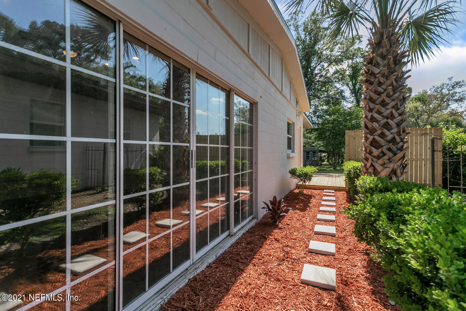 2978 Alonso Road Jacksonville, FL 32216 - Photo 27 of 34 Side Path to Backyard
