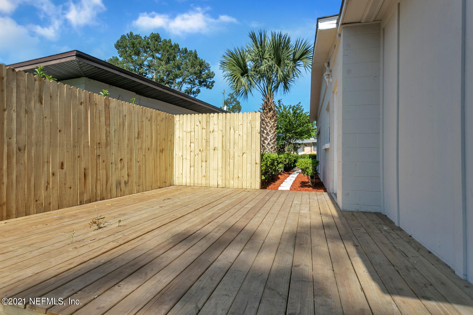 2978 Alonso Road Jacksonville, FL 32216 - Photo 28 of 34 Side Yard Deck