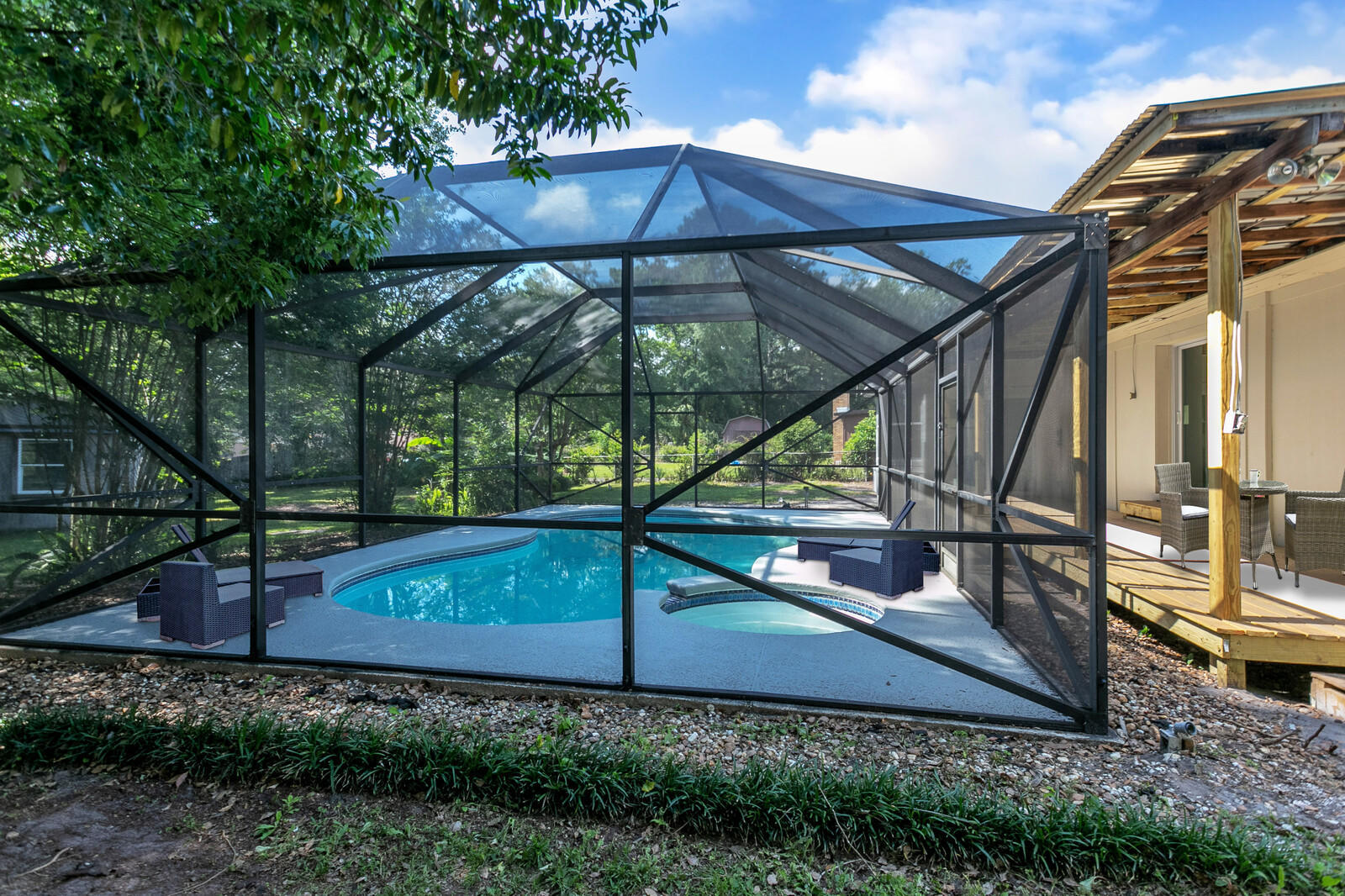 2978 Alonso Road Jacksonville, FL 32216 - Photo 31 of 34 Pool & Covered Deck