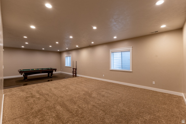 3565 West 1350th Street North Vernal, UT 84078 - Photo 44 of 54 Expansive carpeted room featuring recessed lighting, painted walls, and white trim