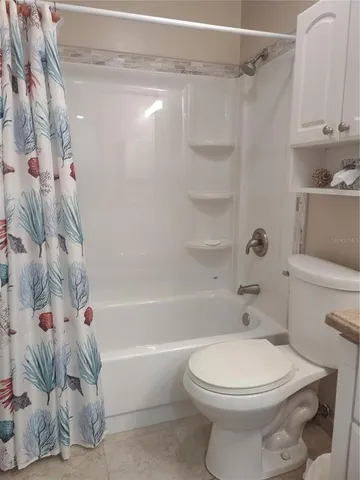 a view of a livingroom with furniture and a couch