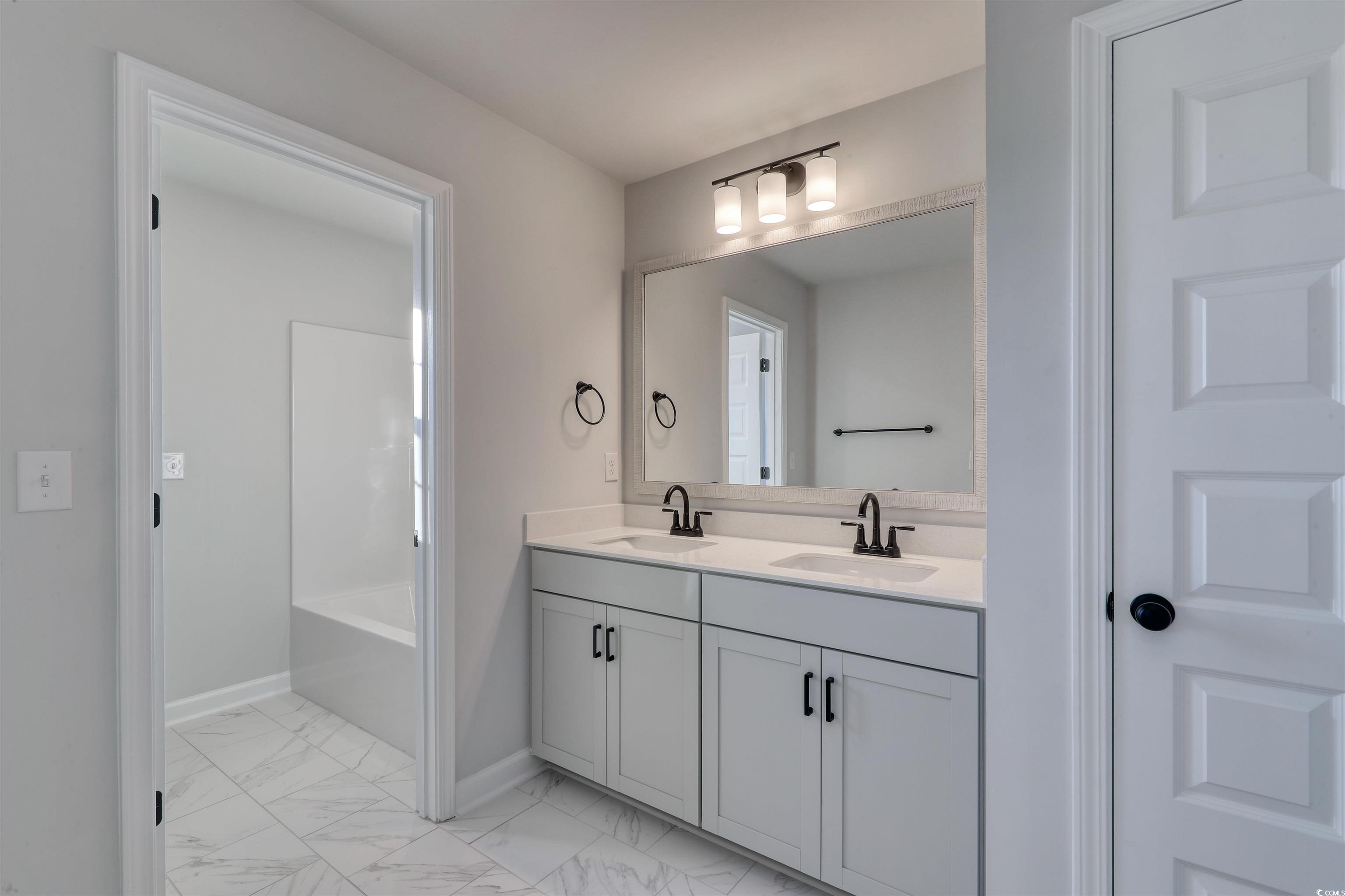 181 Azure Loop Myrtle Beach, SC 29588 - Photo 20 of 40 Bathroom with vanity