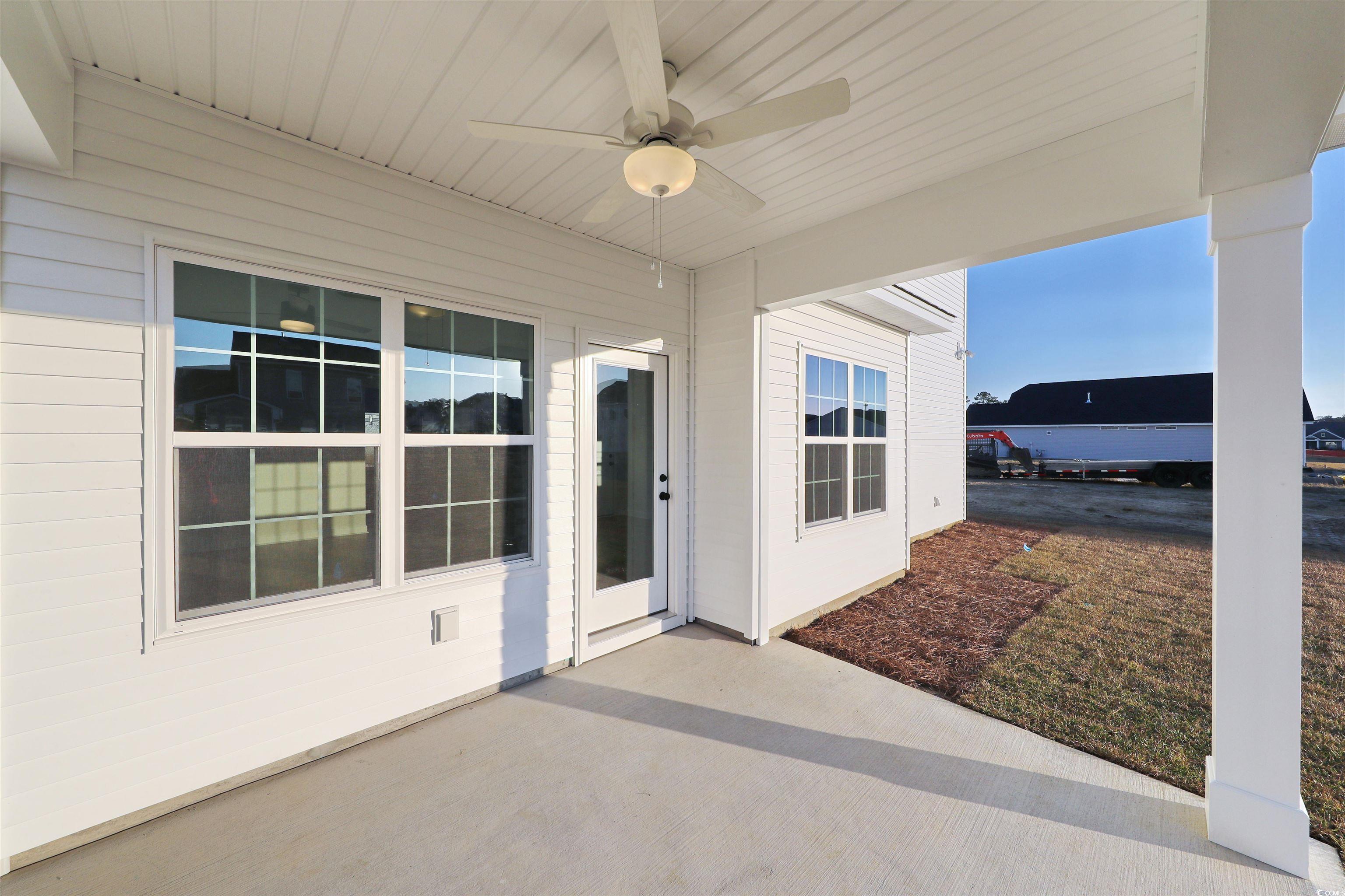 181 Azure Loop Myrtle Beach, SC 29588 - Photo 27 of 40 View of patio featuring ceiling fan