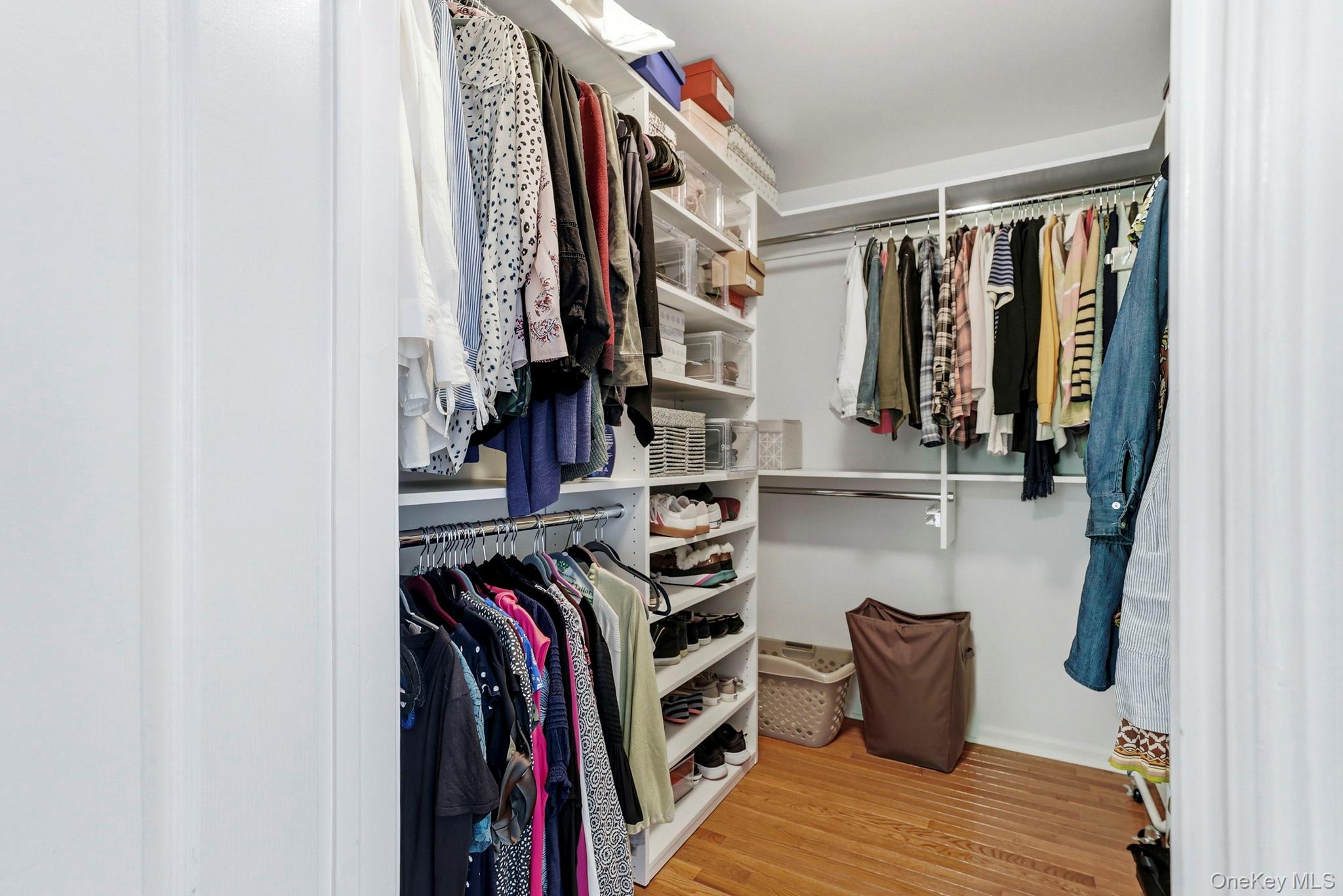 31 Ridge Road Cortlandt Manor, NY 10567 - Photo 31 of 39 The primary closet has custom built-ins - plenty of organized storage!