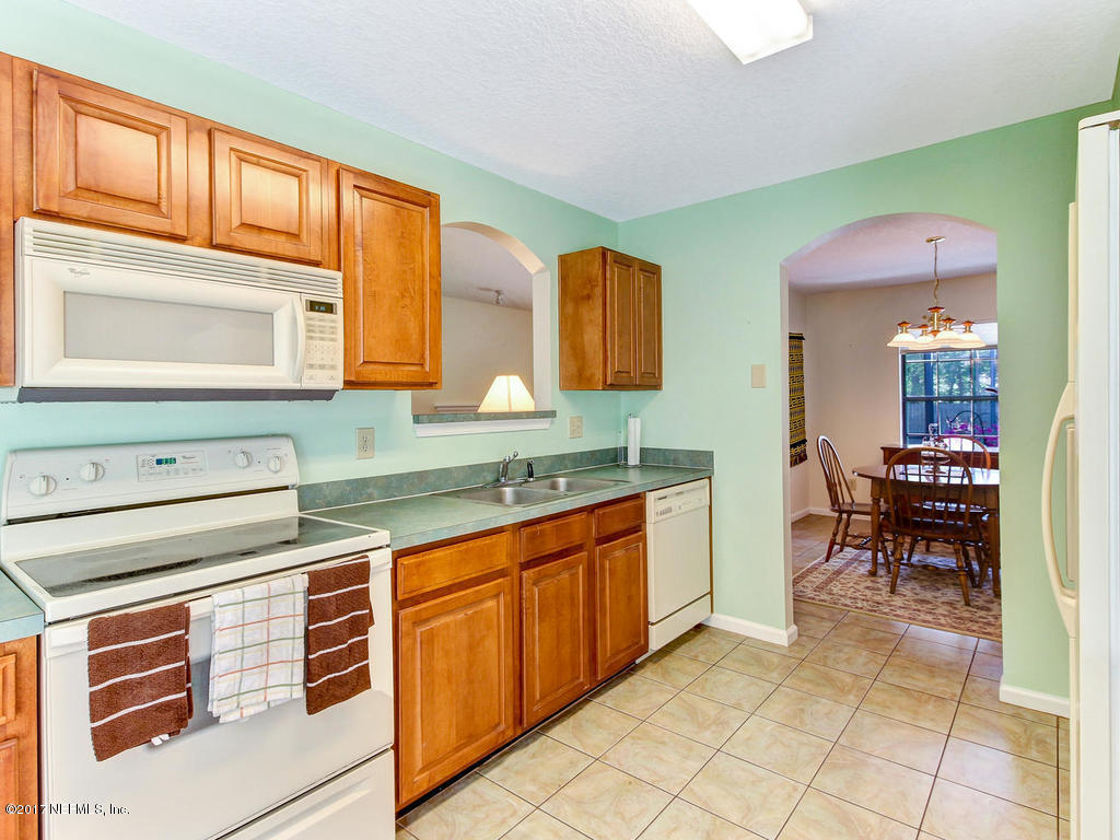 1875 Old Fleming Grove Road Fleming Island, FL 32003 - Photo 11 of 47 Kitchen into Dining Room