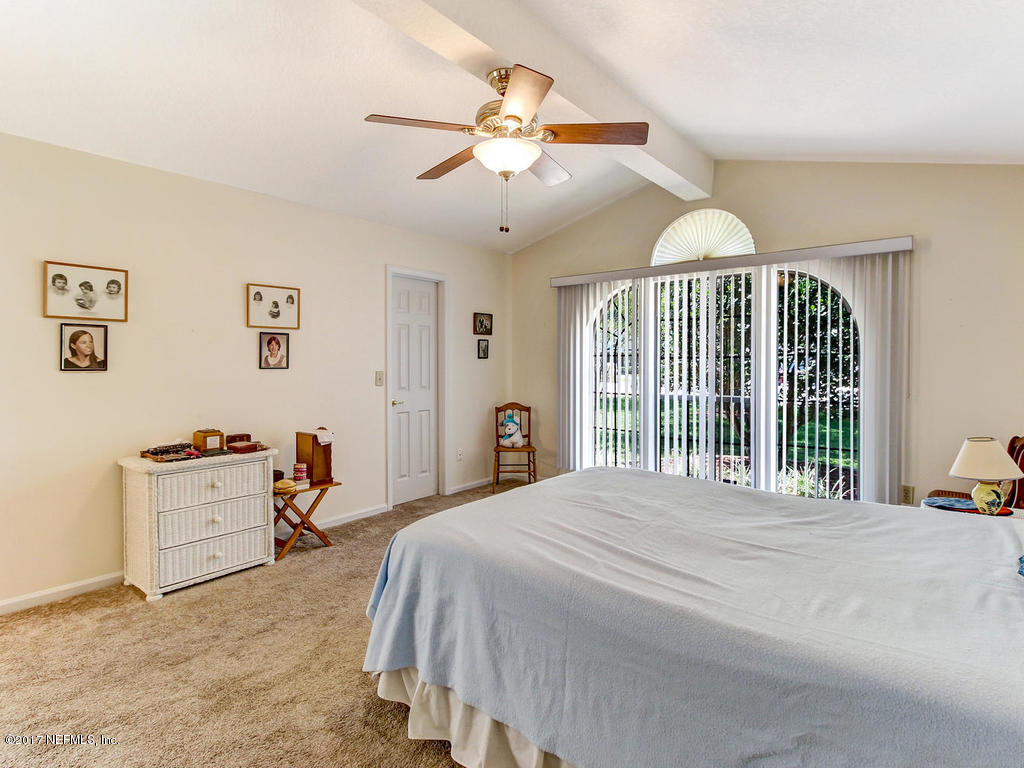 1875 Old Fleming Grove Road Fleming Island, FL 32003 - Photo 21 of 47 Master Bedroom with outdoor access