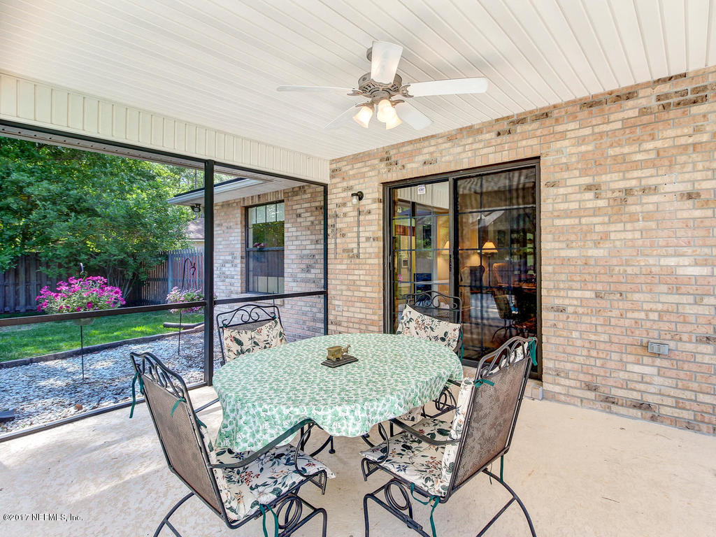 1875 Old Fleming Grove Road Fleming Island, FL 32003 - Photo 29 of 47 Porch to Inside