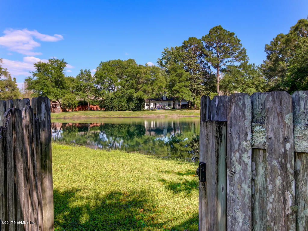1875 Old Fleming Grove Road Fleming Island, FL 32003 - Photo 39 of 47 Gate going to pond