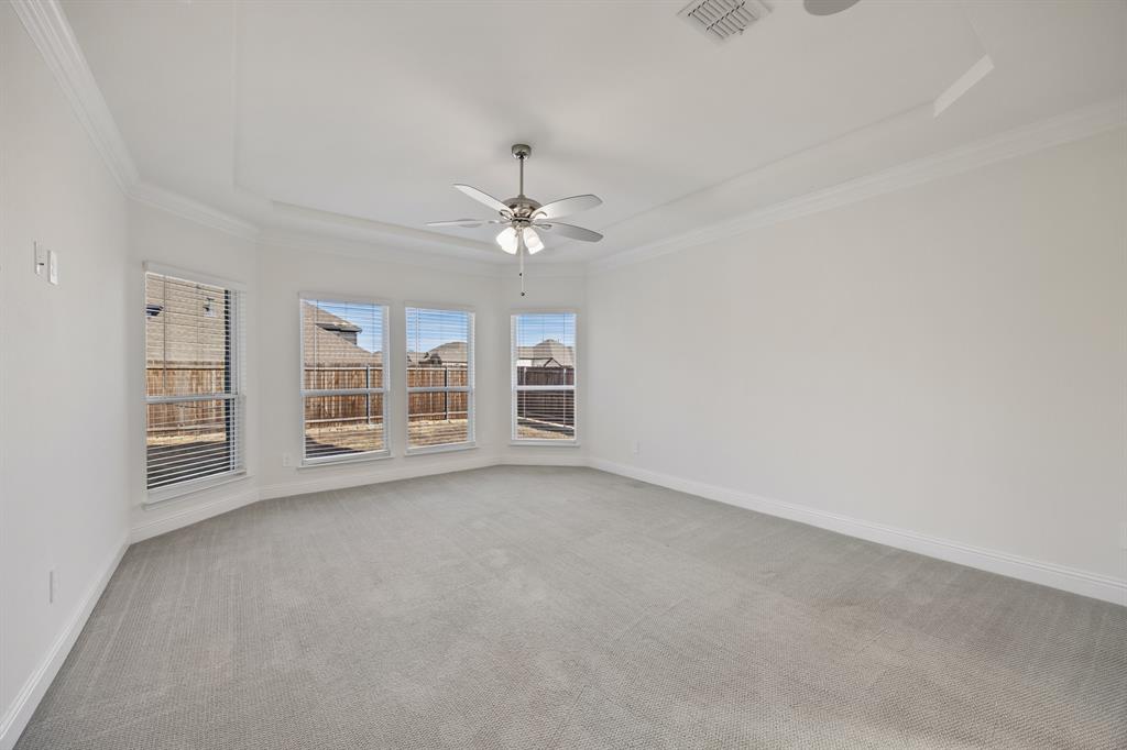 408 Piper Lane Fate, TX 75087 - Photo 18 of 40 Primary bedroom