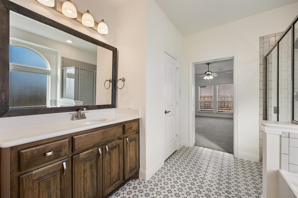 408 Piper Lane Fate, TX 75087 - Photo 21 of 40 Primary bathroom