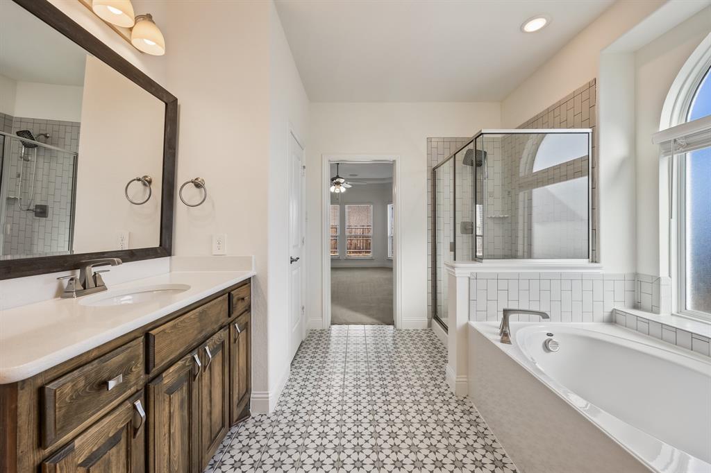 408 Piper Lane Fate, TX 75087 - Photo 22 of 40 Primary bathroom
