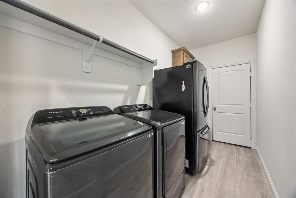 408 Piper Lane Fate, TX 75087 - Photo 25 of 40 Laundry room. Appliances will convey.