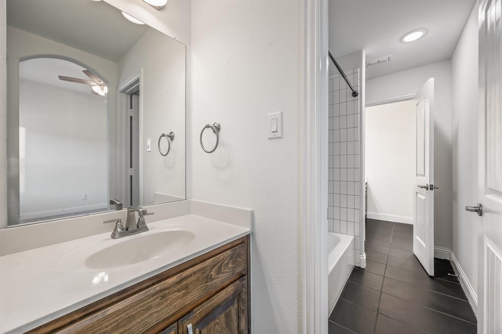 408 Piper Lane Fate, TX 75087 - Photo 33 of 40 Jack and Jill bathroom connecting bedrooms 3 and 4
