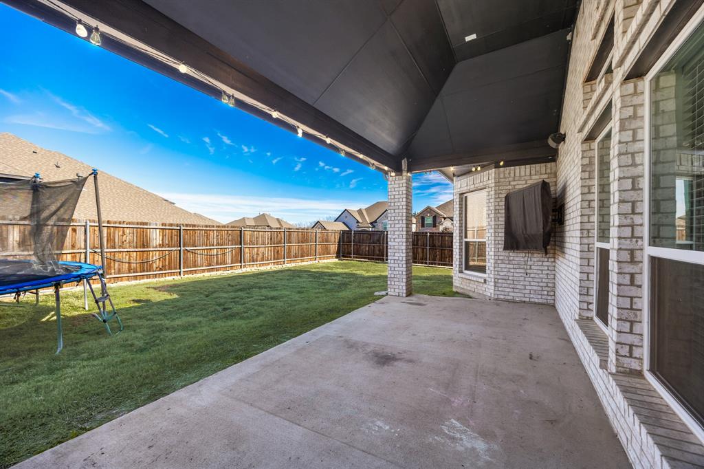 408 Piper Lane Fate, TX 75087 - Photo 37 of 40 Covered back patio. TV will convey.