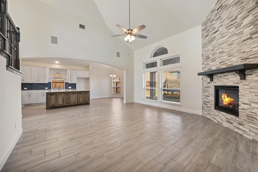408 Piper Lane Fate, TX 75087 - Photo 10 of 40 Living room and kitchen