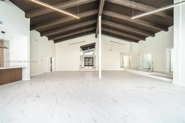 a kitchen with stainless steel appliances granite countertop a stove and a sink