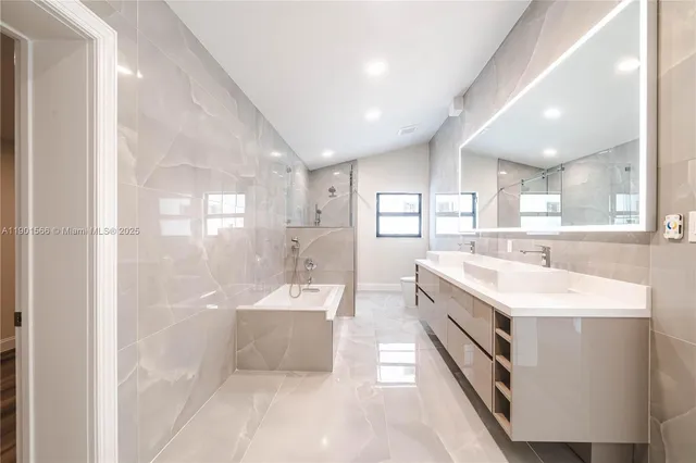 a view of a room with wooden floor and windows