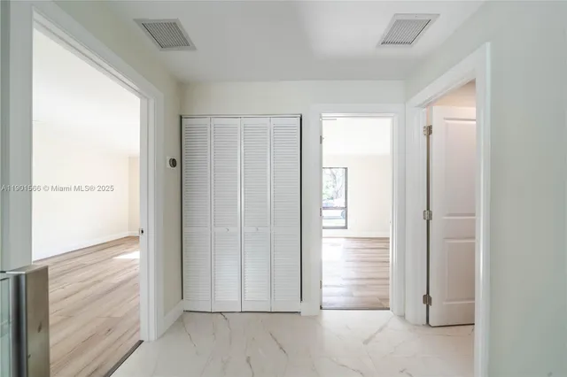 a view of a swimming pool with a yard