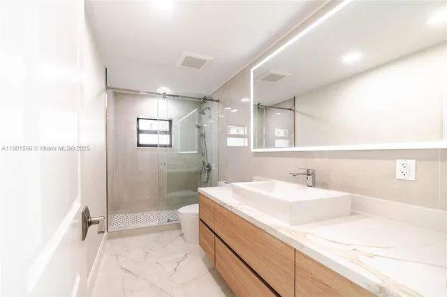 a view of a garden with a pathway