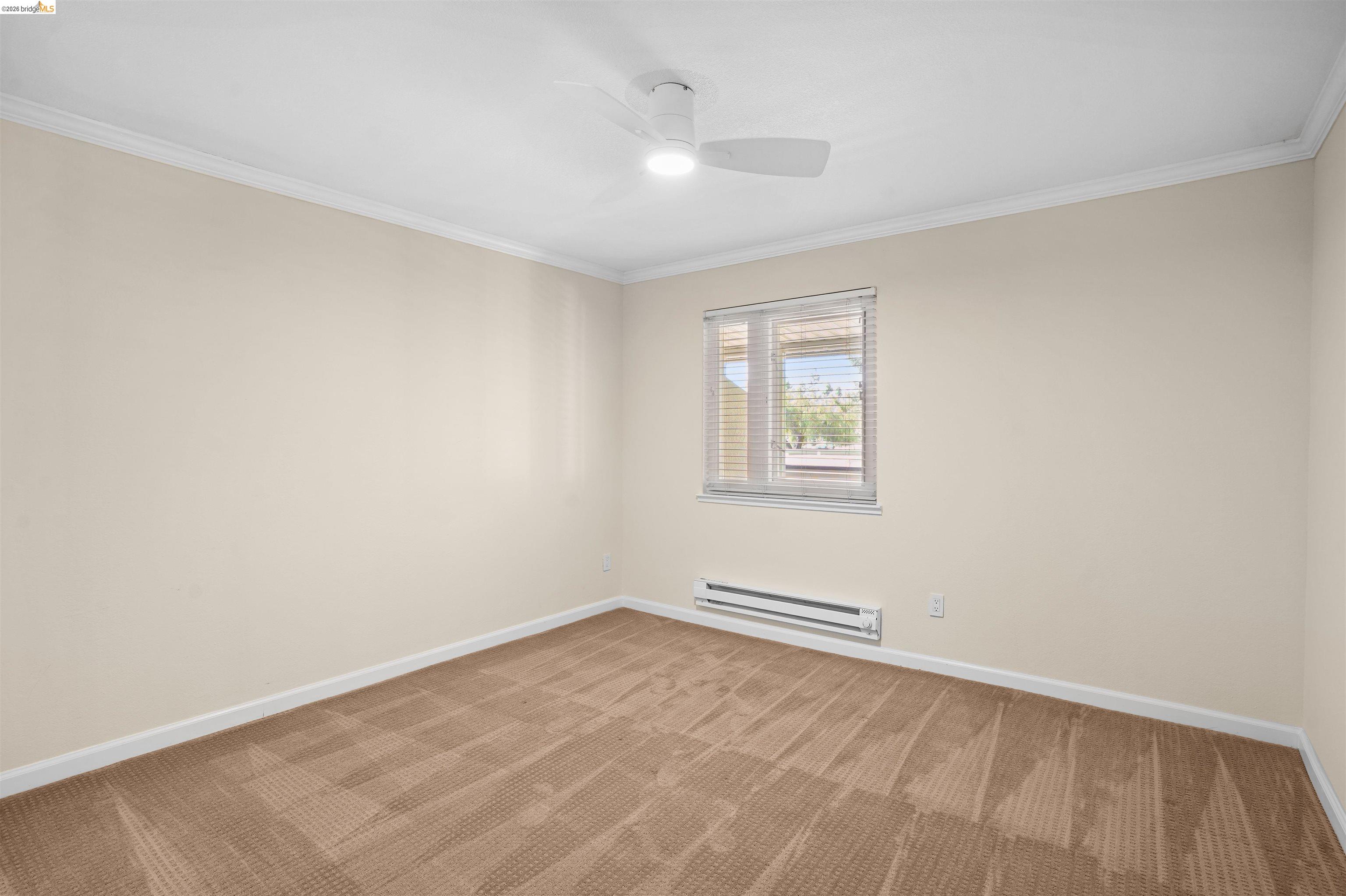 1505 Kirker Pass Road, Unit 214 Concord, CA 94521 - Photo 29 of 55 Neutral-toned walls complement the carpeted flooring
