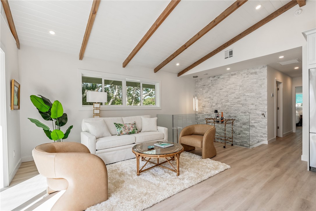 1881 Pebble Path Vero Beach, FL 32963 - Photo 11 of 34 a living room with furniture and a potted plant