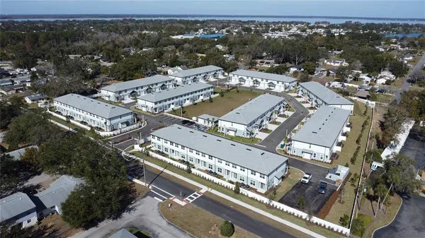 an aerial view of a city with lots of residential buildings
