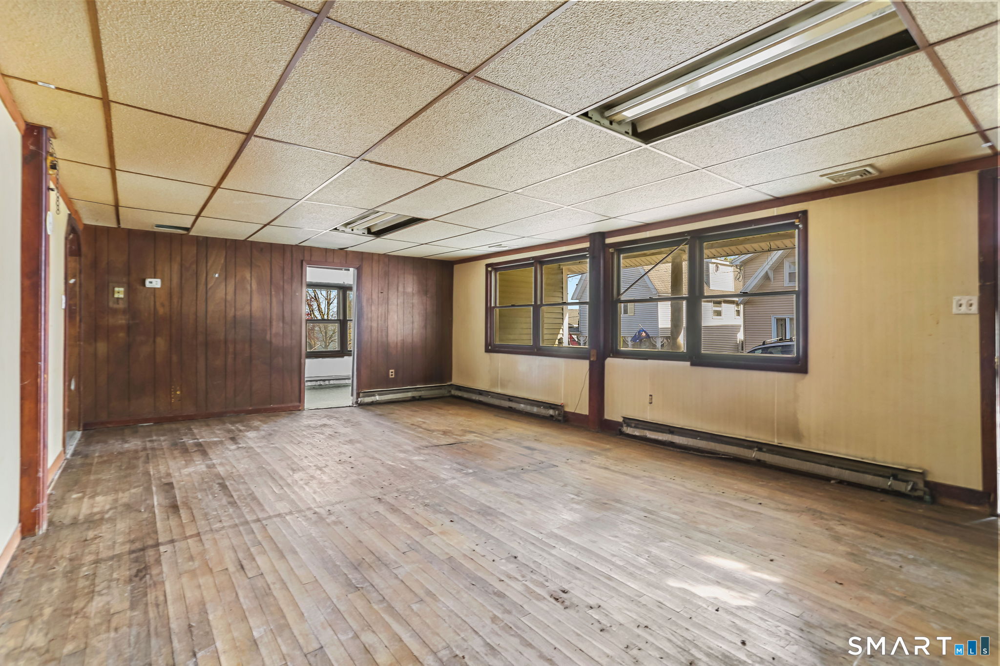 39 Soundview Avenue Milford, CT 06460 - Photo 6 of 18 a view of an empty room with a window