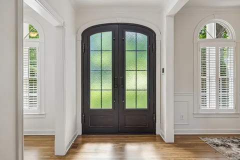 a view of entryway with wooden floor