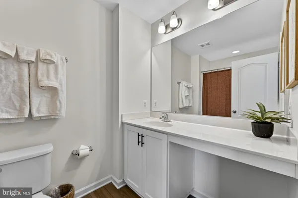 a bathroom with a double vanity sink and a
