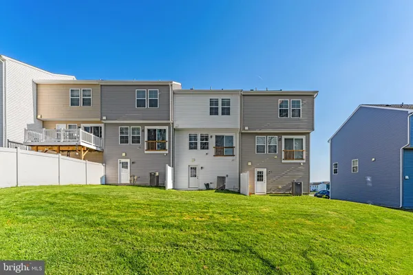 a picture of a bench in front of a door
