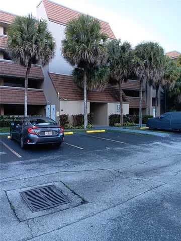 a car parked in front of a building