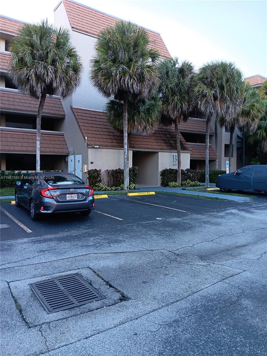 a car parked in front of a building