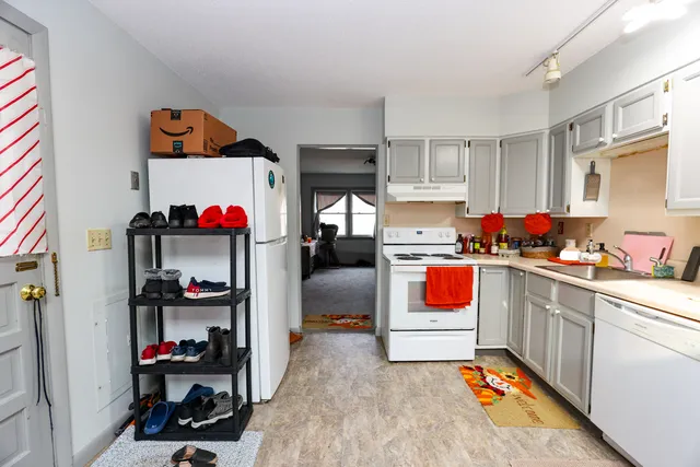 a bathroom with a sink toilet and mirror