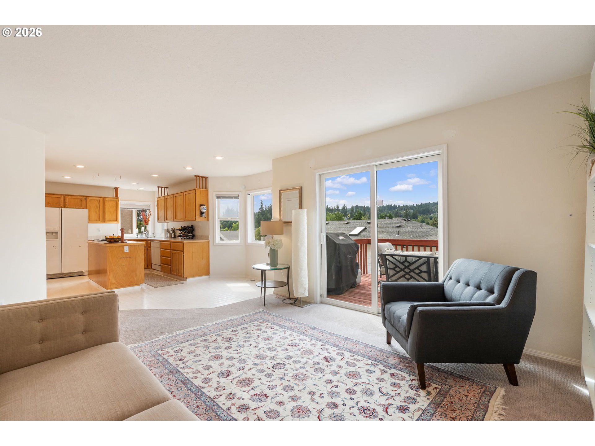 8943 Southwest 149th Place Beaverton, OR 97007 - Photo 14 of 41 a living room with furniture and a table
