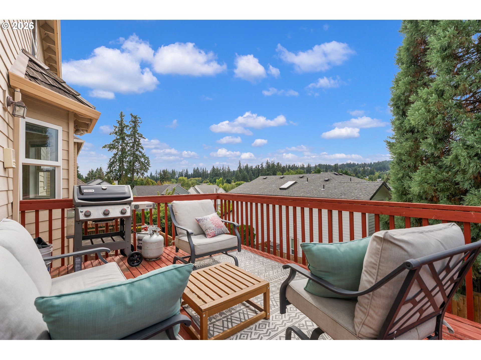 8943 Southwest 149th Place Beaverton, OR 97007 - Photo 18 of 41 a view of a chair and tables the fire pit