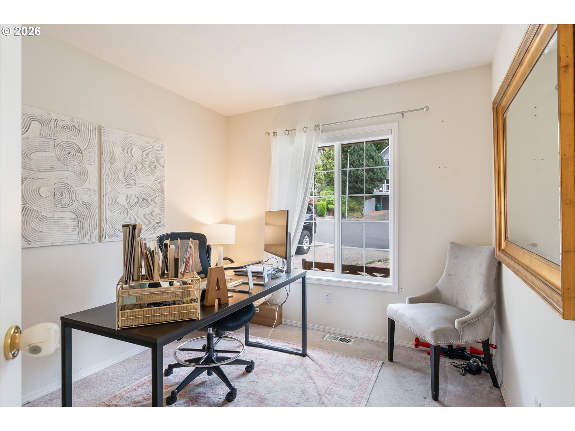 8943 Southwest 149th Place Beaverton, OR 97007 - Photo 20 of 41 a living room with furniture and a window