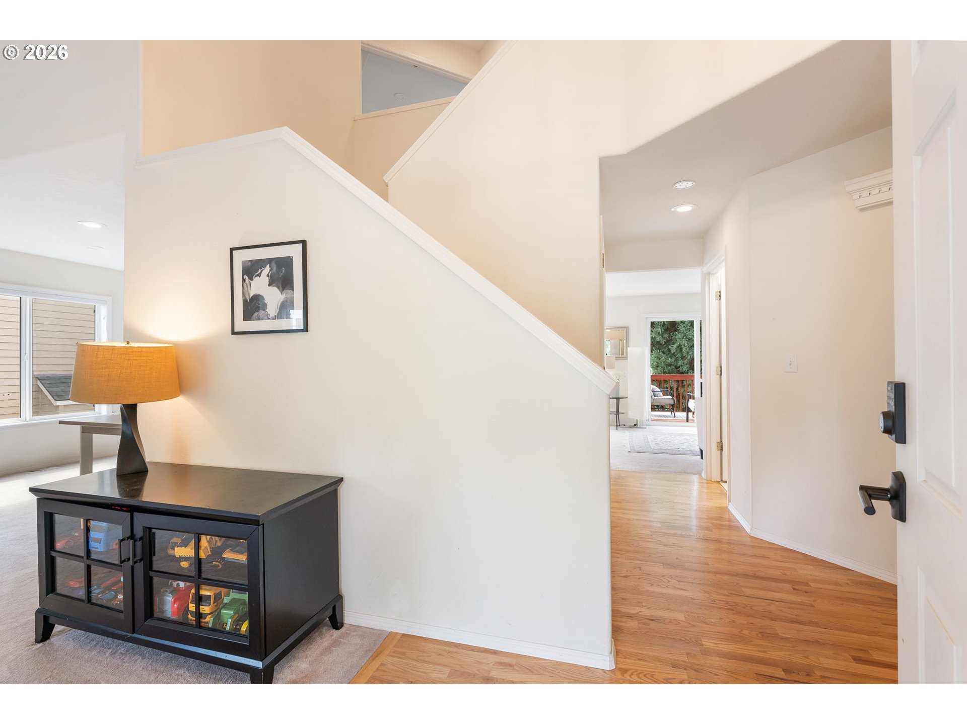 8943 Southwest 149th Place Beaverton, OR 97007 - Photo 2 of 41 a living room with furniture and a lamp