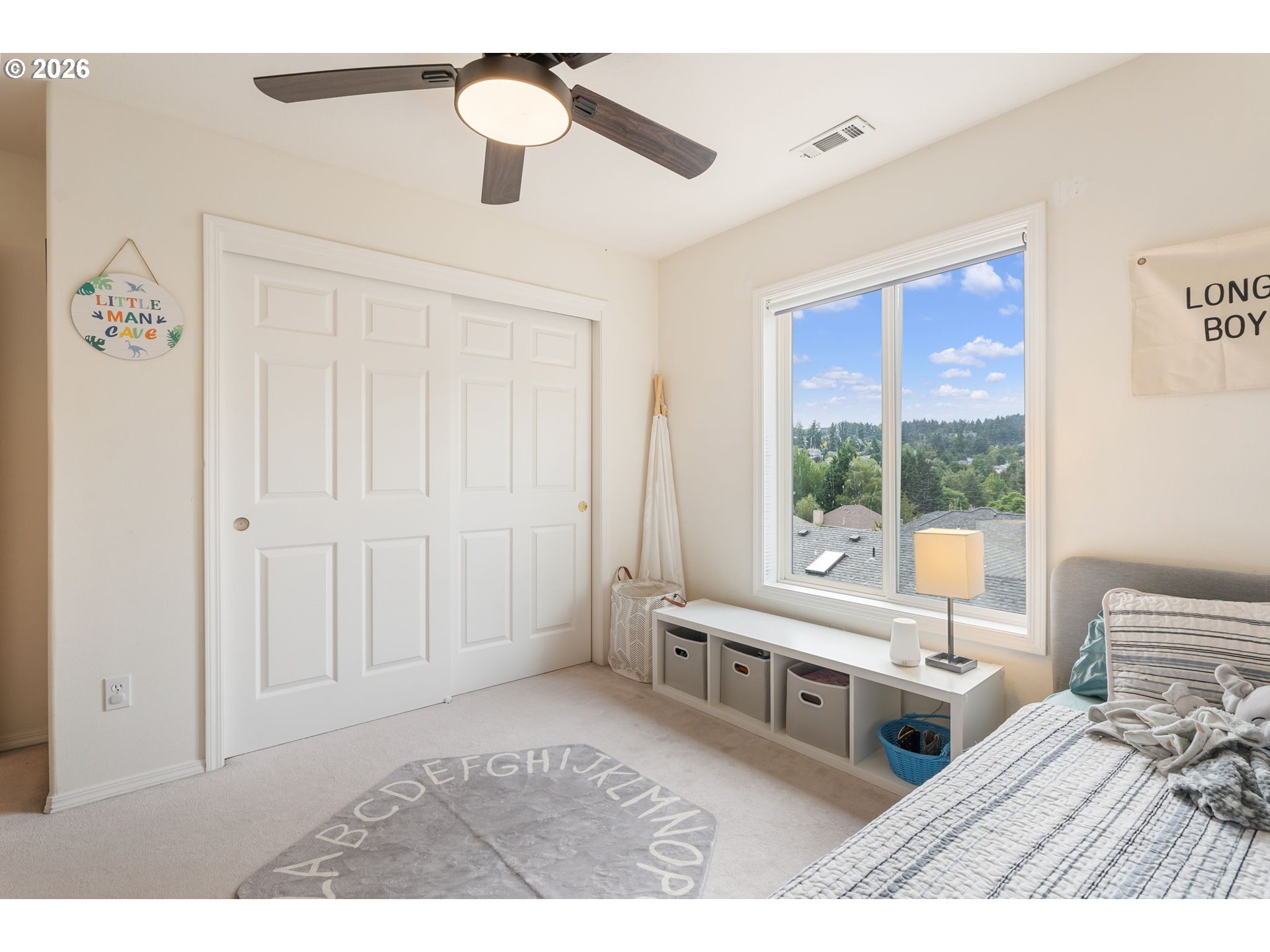 8943 Southwest 149th Place Beaverton, OR 97007 - Photo 28 of 41 a living room with furniture and a window