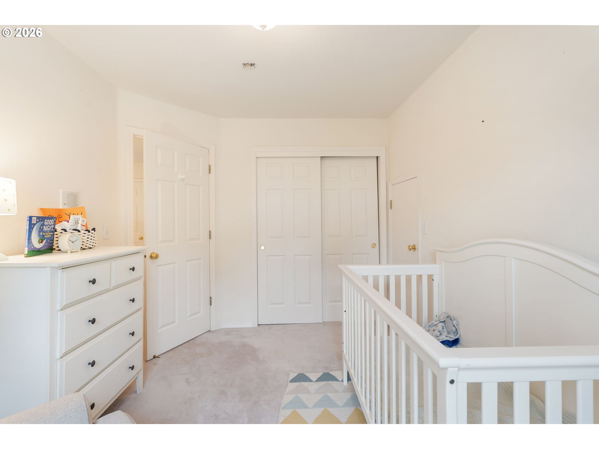 8943 Southwest 149th Place Beaverton, OR 97007 - Photo 30 of 41 a view of an entryway with wooden floor