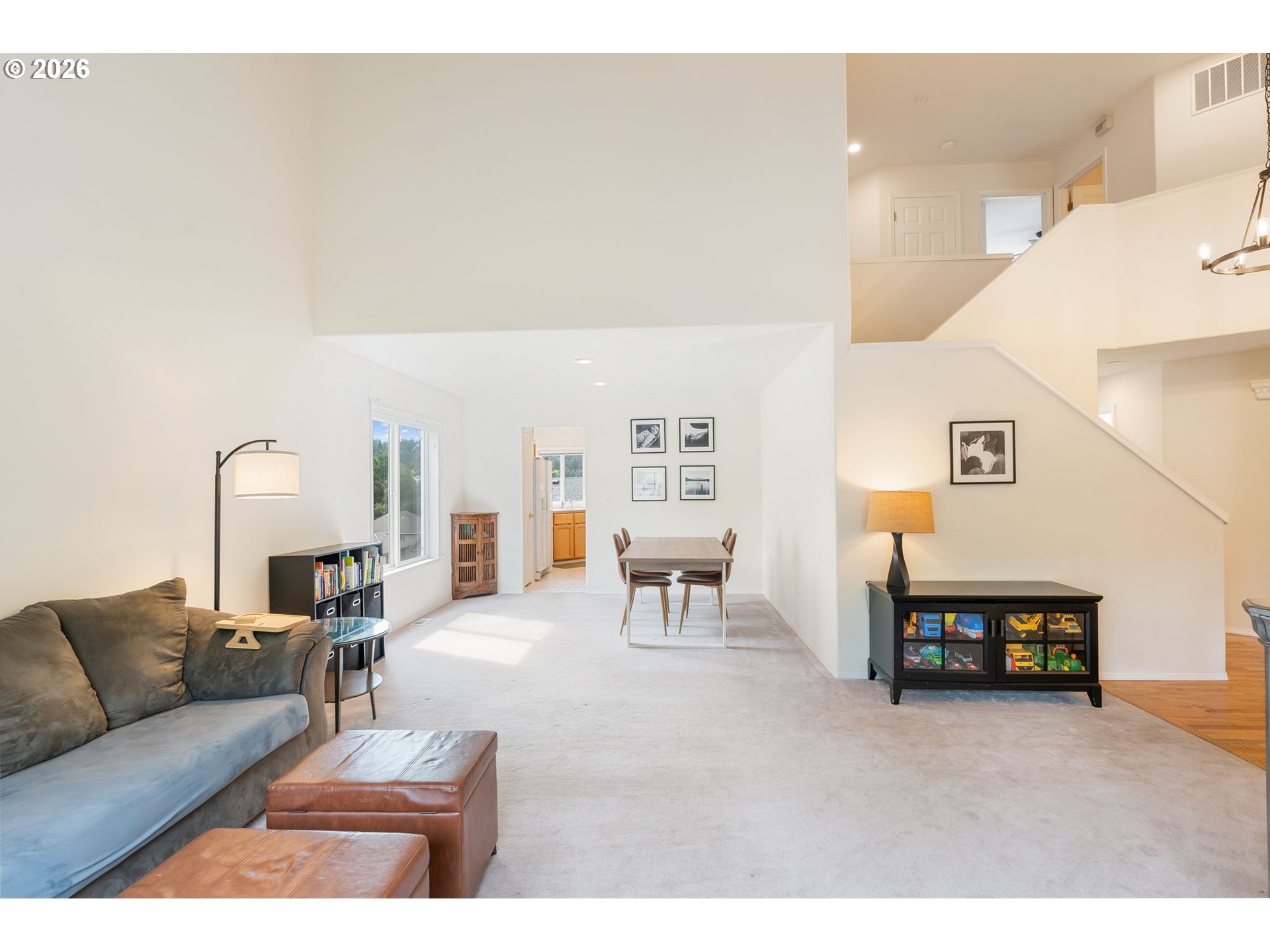 8943 Southwest 149th Place Beaverton, OR 97007 - Photo 3 of 41 a living room with furniture and a couch