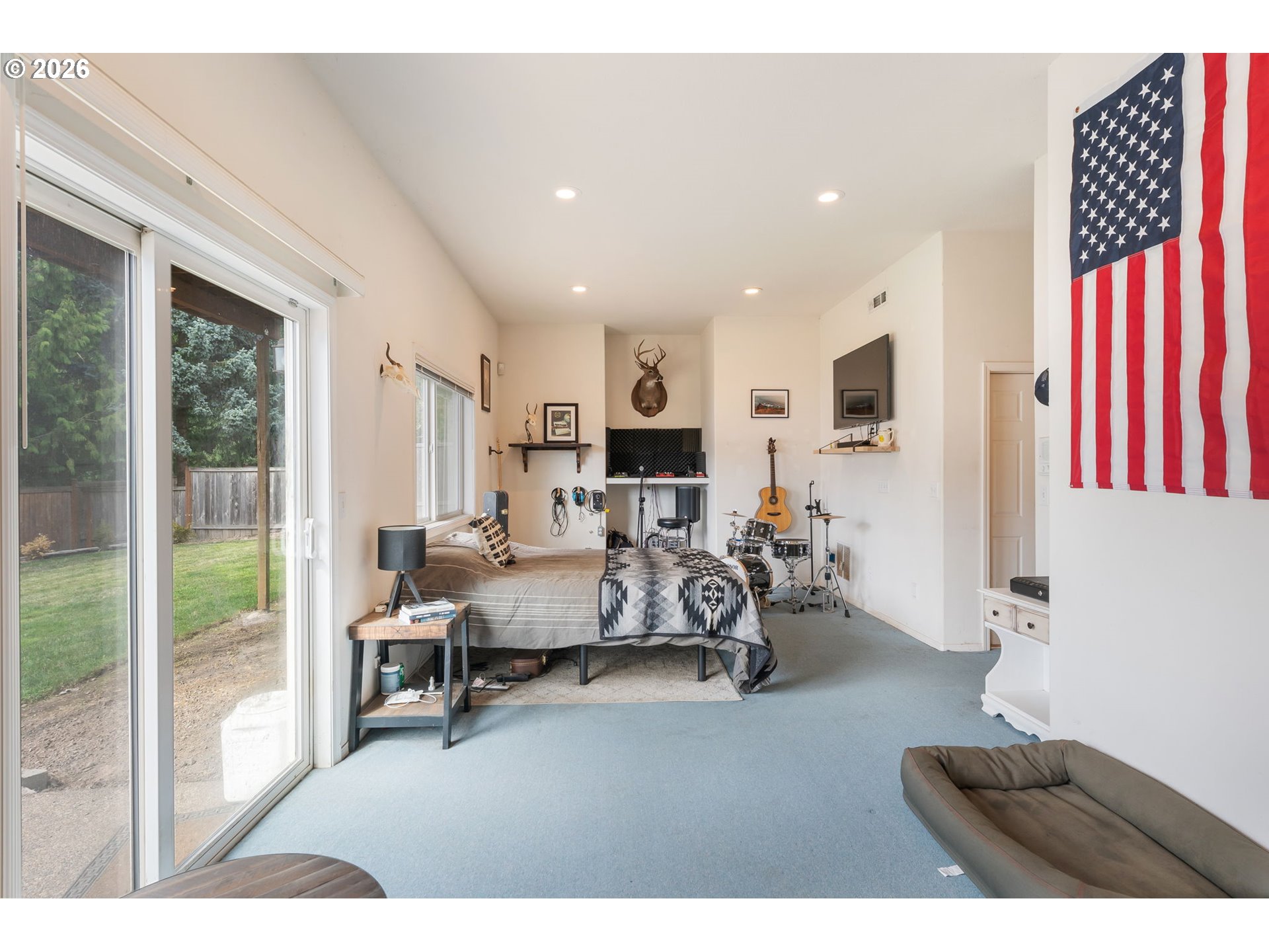 8943 Southwest 149th Place Beaverton, OR 97007 - Photo 34 of 41 a living room with furniture and a large window