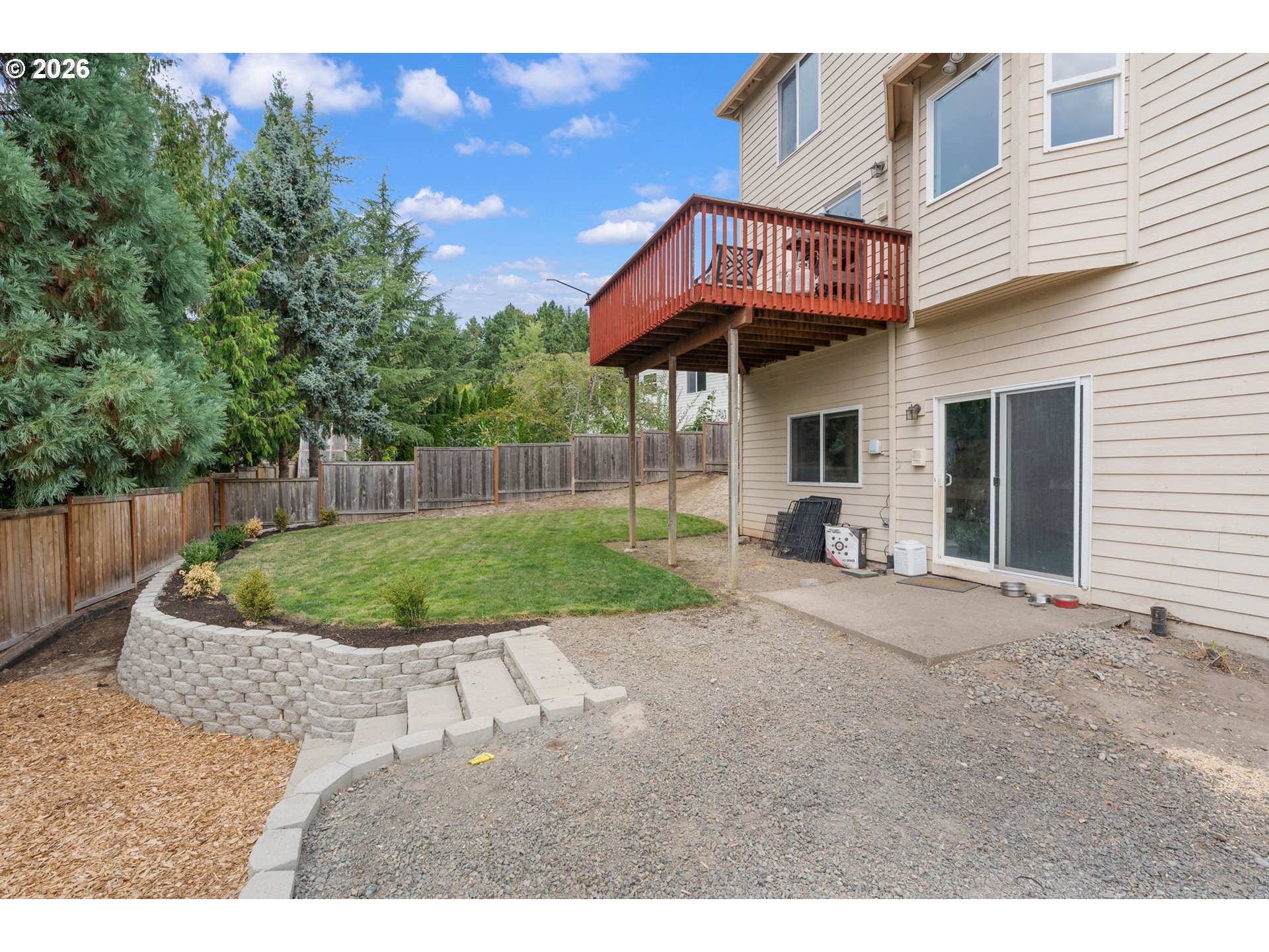 8943 Southwest 149th Place Beaverton, OR 97007 - Photo 36 of 41 a view of a house with a yard