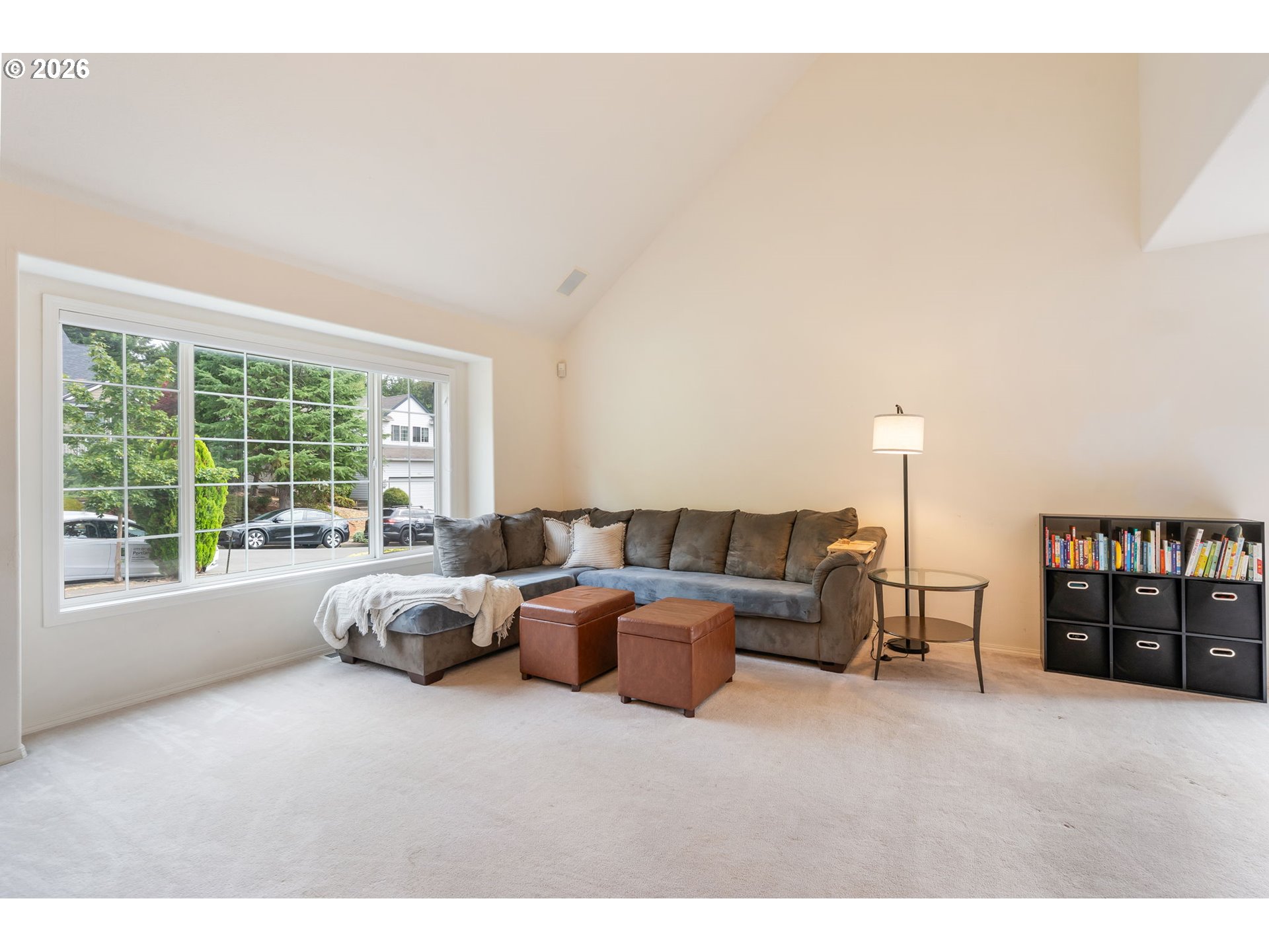 8943 Southwest 149th Place Beaverton, OR 97007 - Photo 5 of 41 a living room with furniture and large window