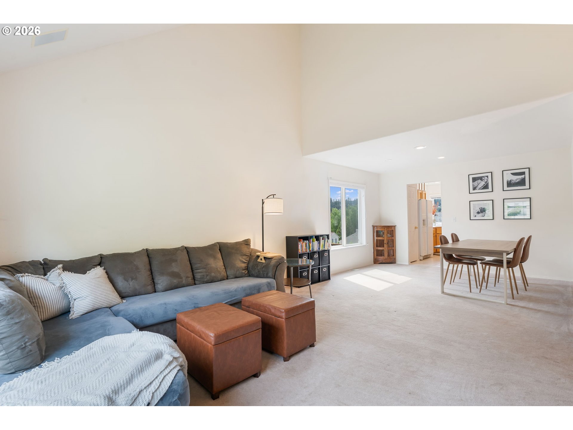 8943 Southwest 149th Place Beaverton, OR 97007 - Photo 6 of 41 a living room with furniture and a table
