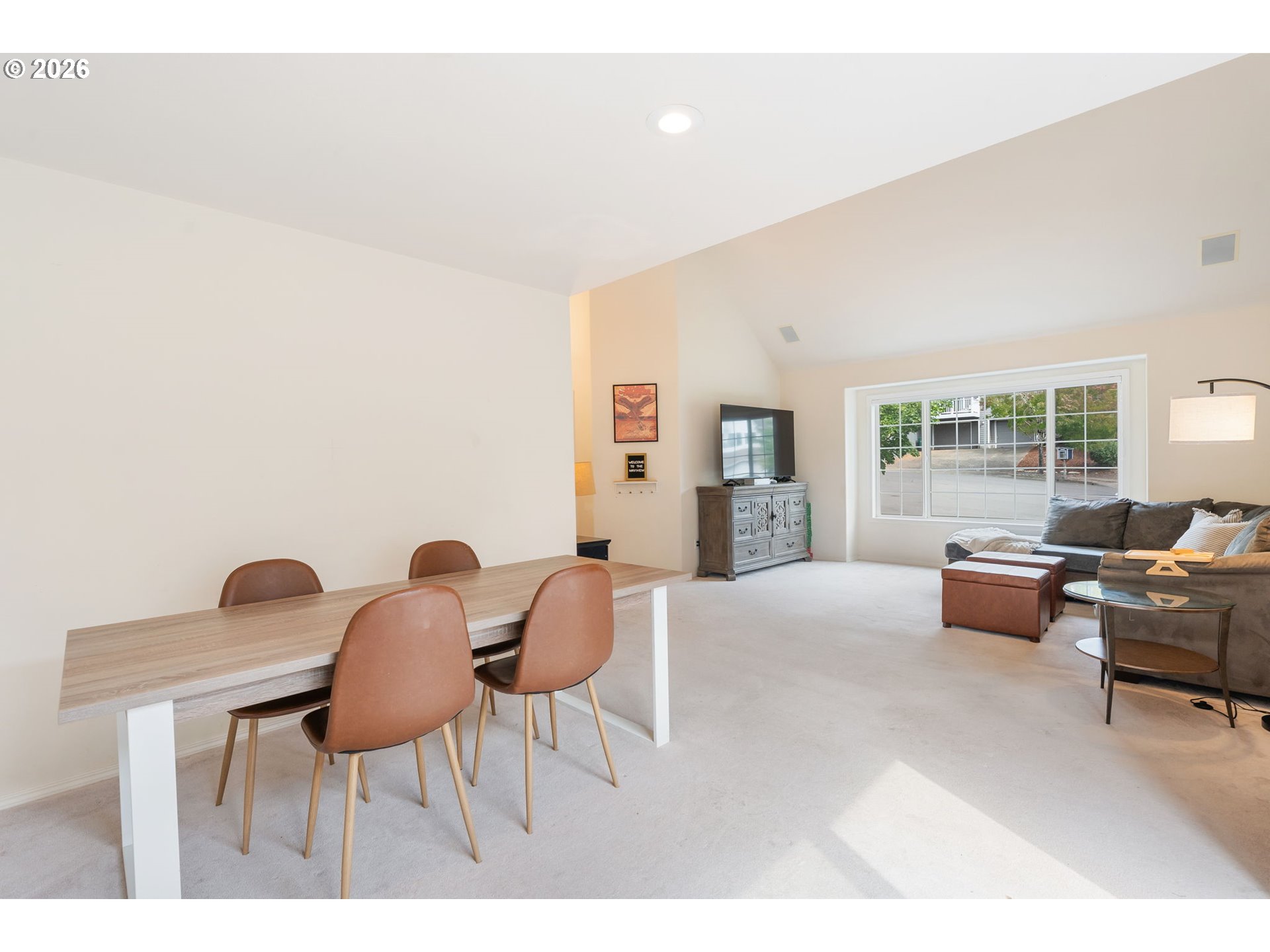 8943 Southwest 149th Place Beaverton, OR 97007 - Photo 7 of 41 a living room with furniture and a large window