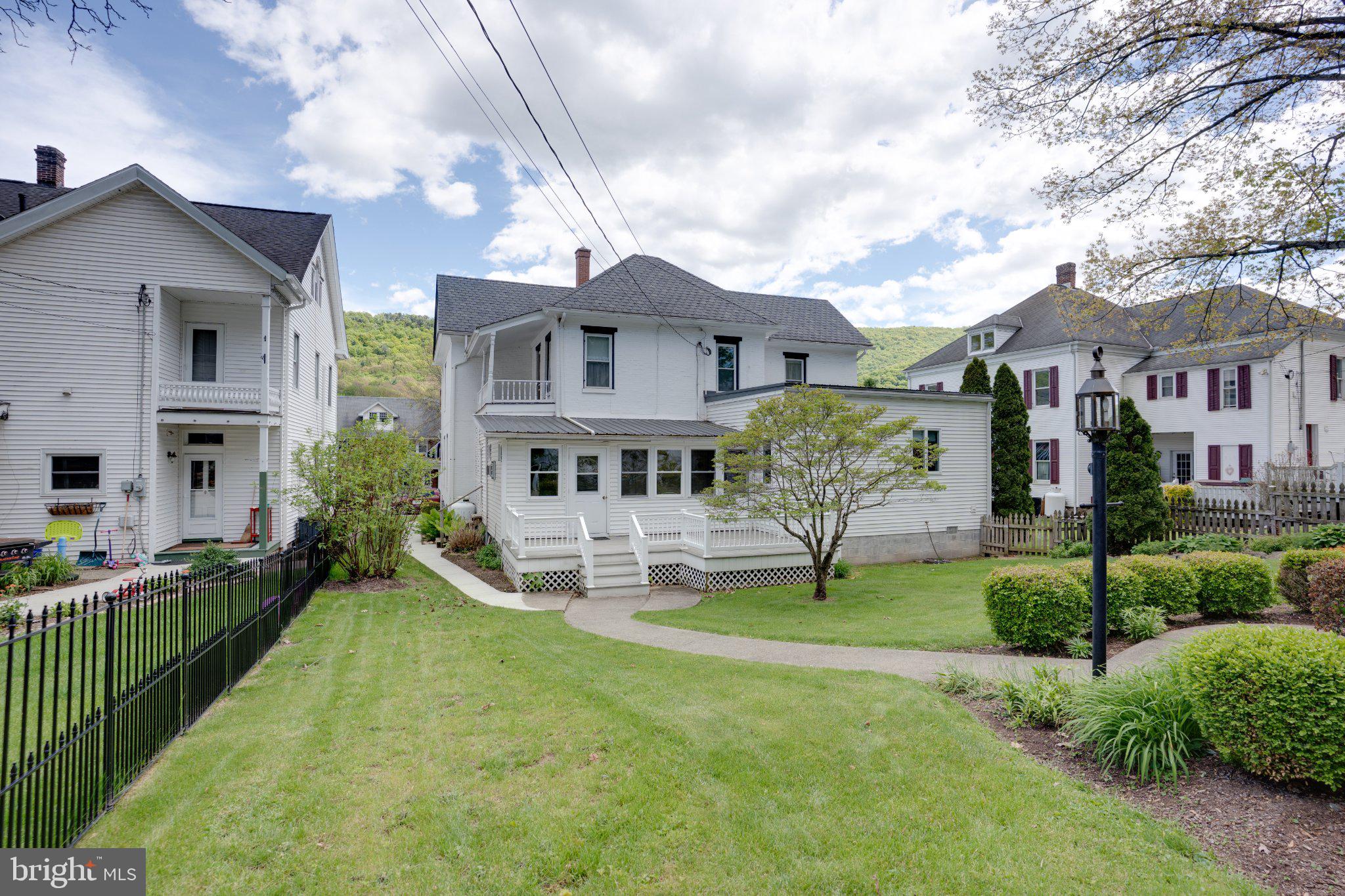 149 Walnut Street Reedsville, PA 17084 - Photo 70 of 83 Charming home with lush green surroundings.