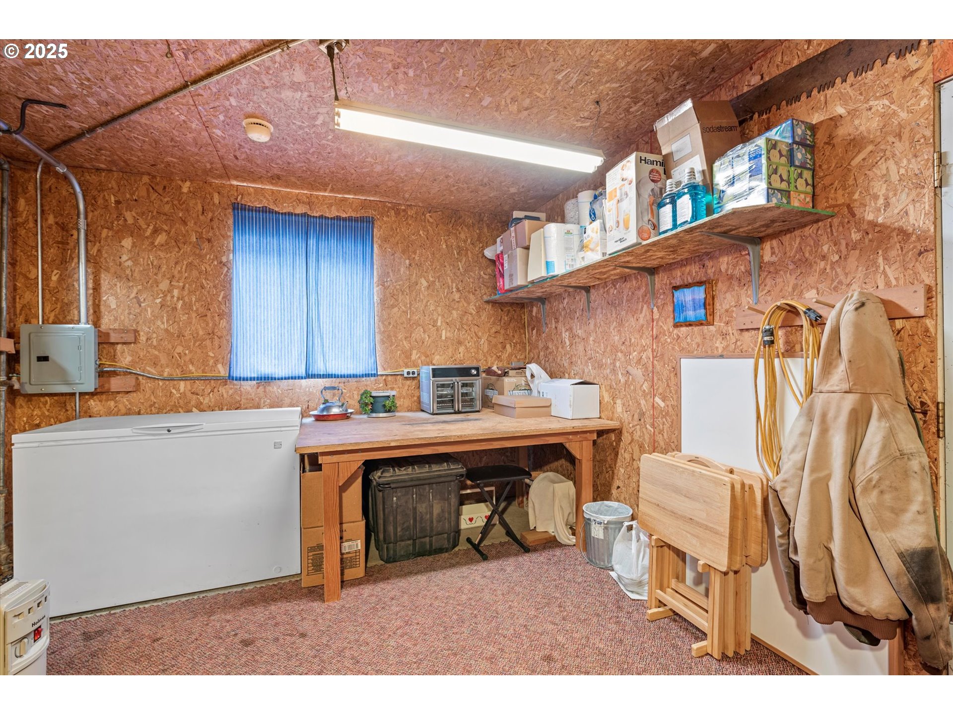 27877 Skinner Road Baker City, OR 97814 - Photo 33 of 48 a kitchen with a sink cabinets and wooden floor