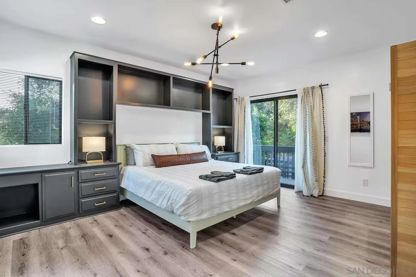 3550 Laketree Drive Fallbrook, CA 92028 - Photo 19 of 56 a bedroom with a bed and a large window