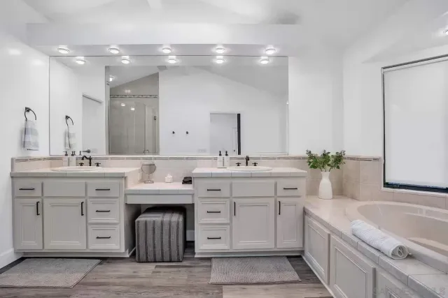 a bathroom with a sink and a shower